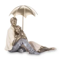 Szerelmes pár az esőben szobor, Arany