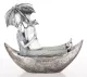 Csónakázó pár az esőben szobor, Ezüst